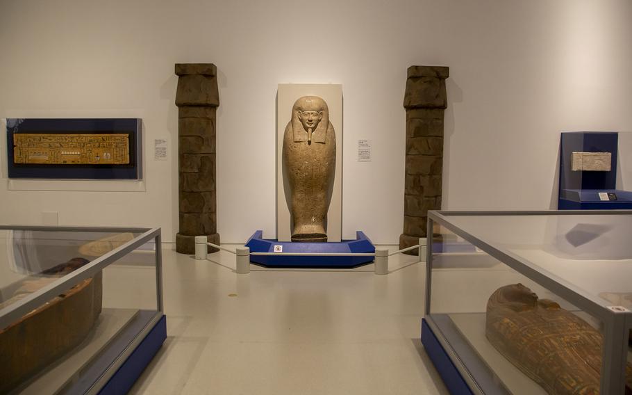 Sarcophagus and stone statues in Afterlife Room